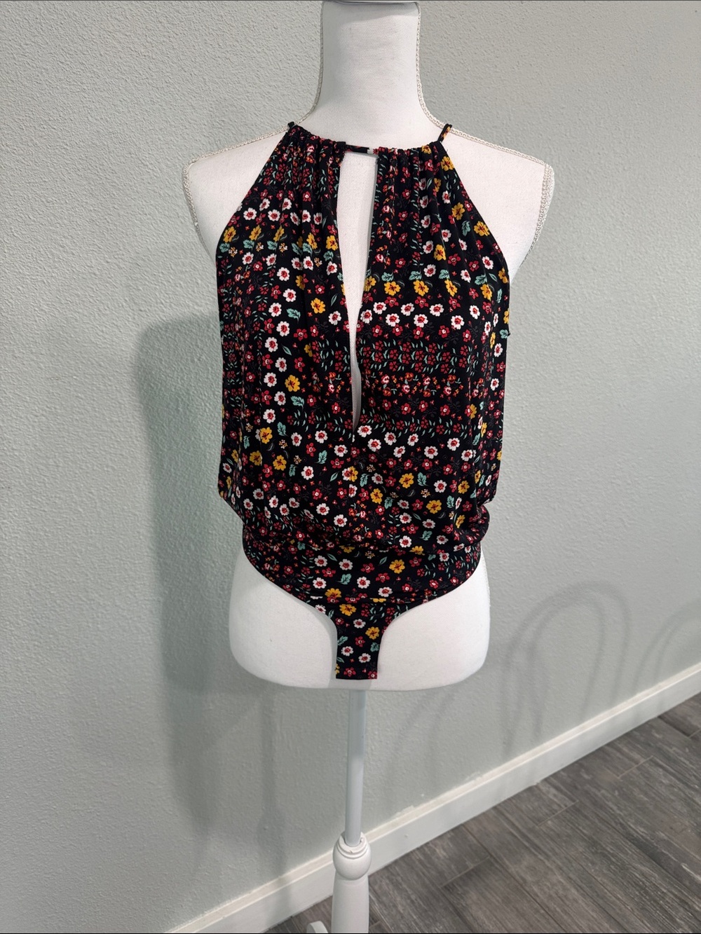 BCBGeneration Black Floral Keyhole Halter Bodysuit